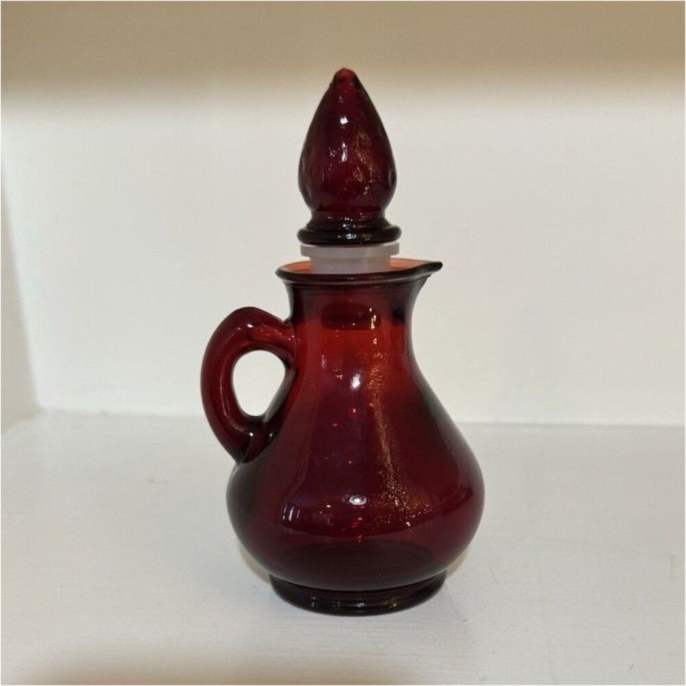 Vintage Avon Ruby Red 4oz Strawberry bath foam bottle. Empty.